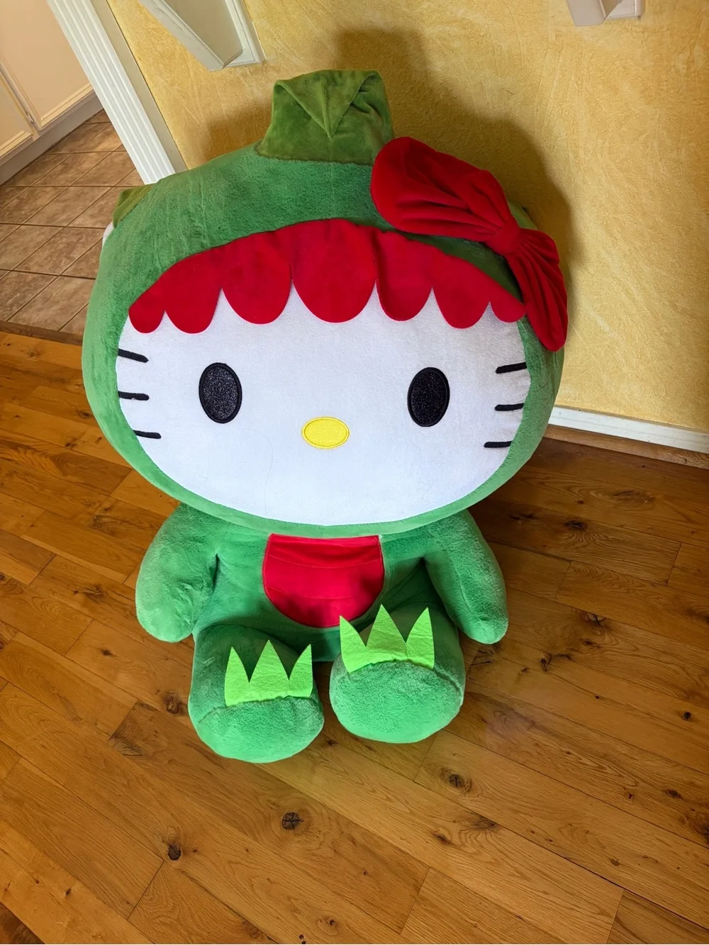 Hello Kitty Green Plush Character with Red Bow